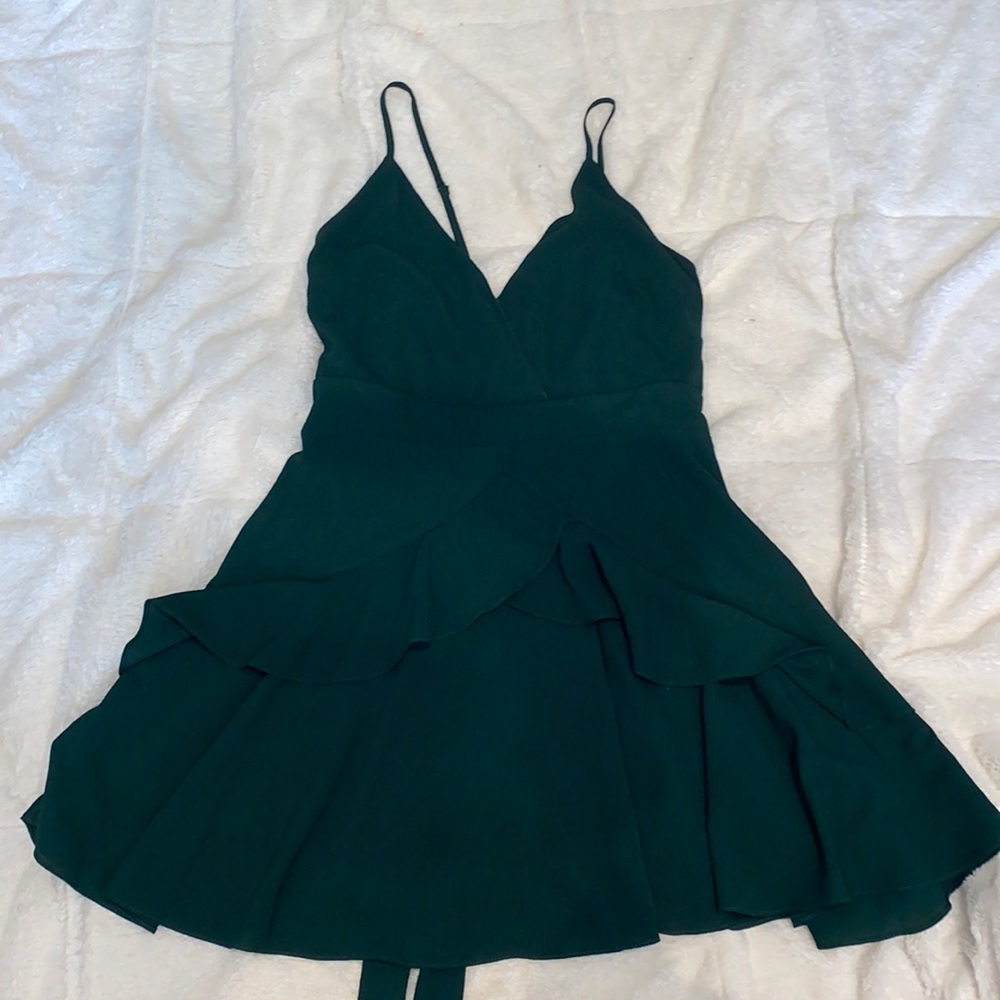 Dark green dress with ruffles